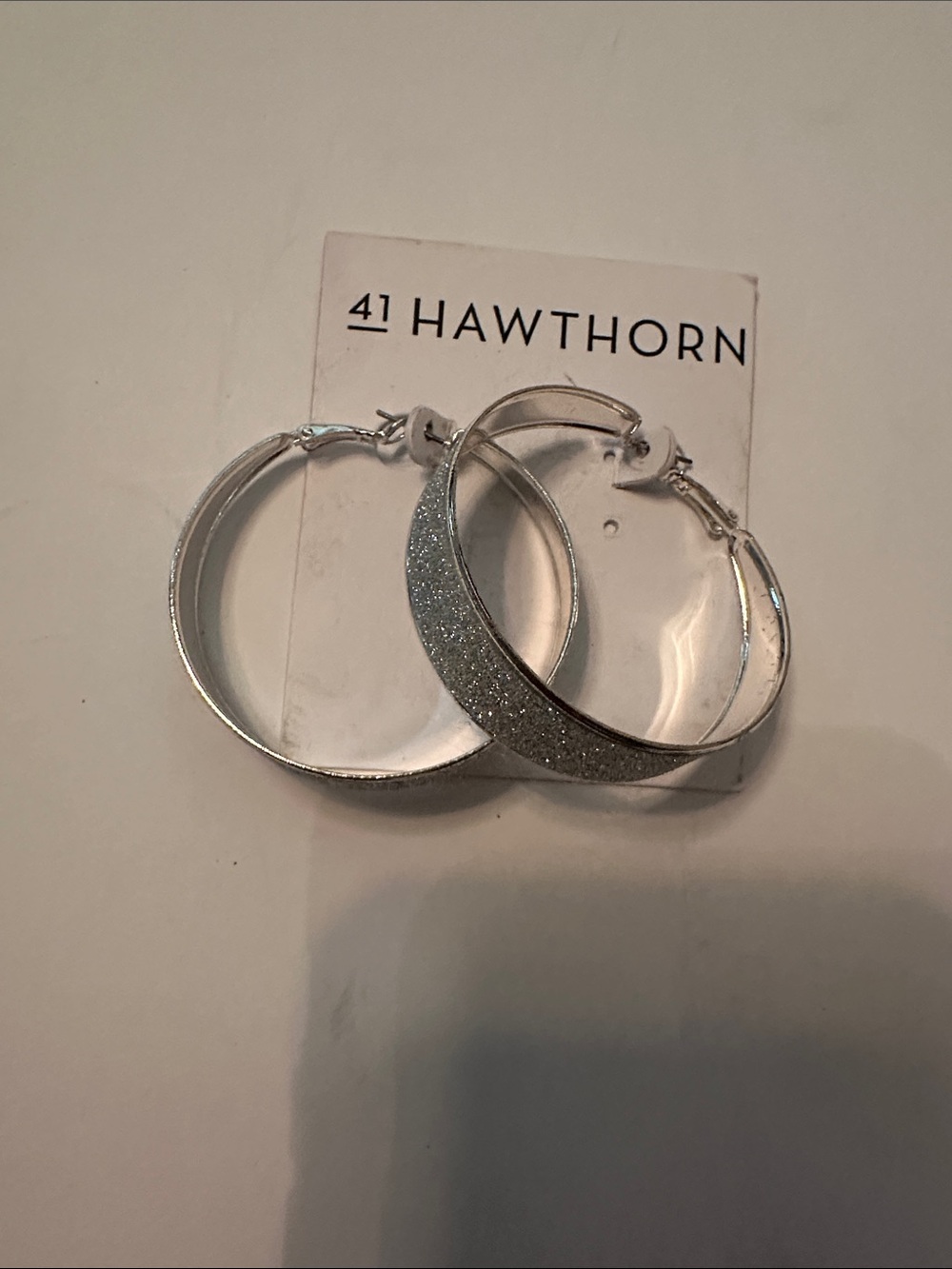 41 Hawthorn Silver Glitter Crescent Hoop Earrings